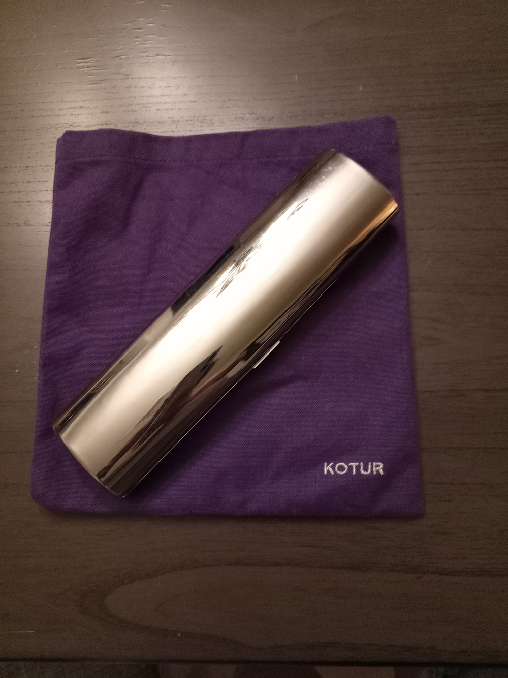 KOTUR Silver Metallic Cylinder Clutch in Silver